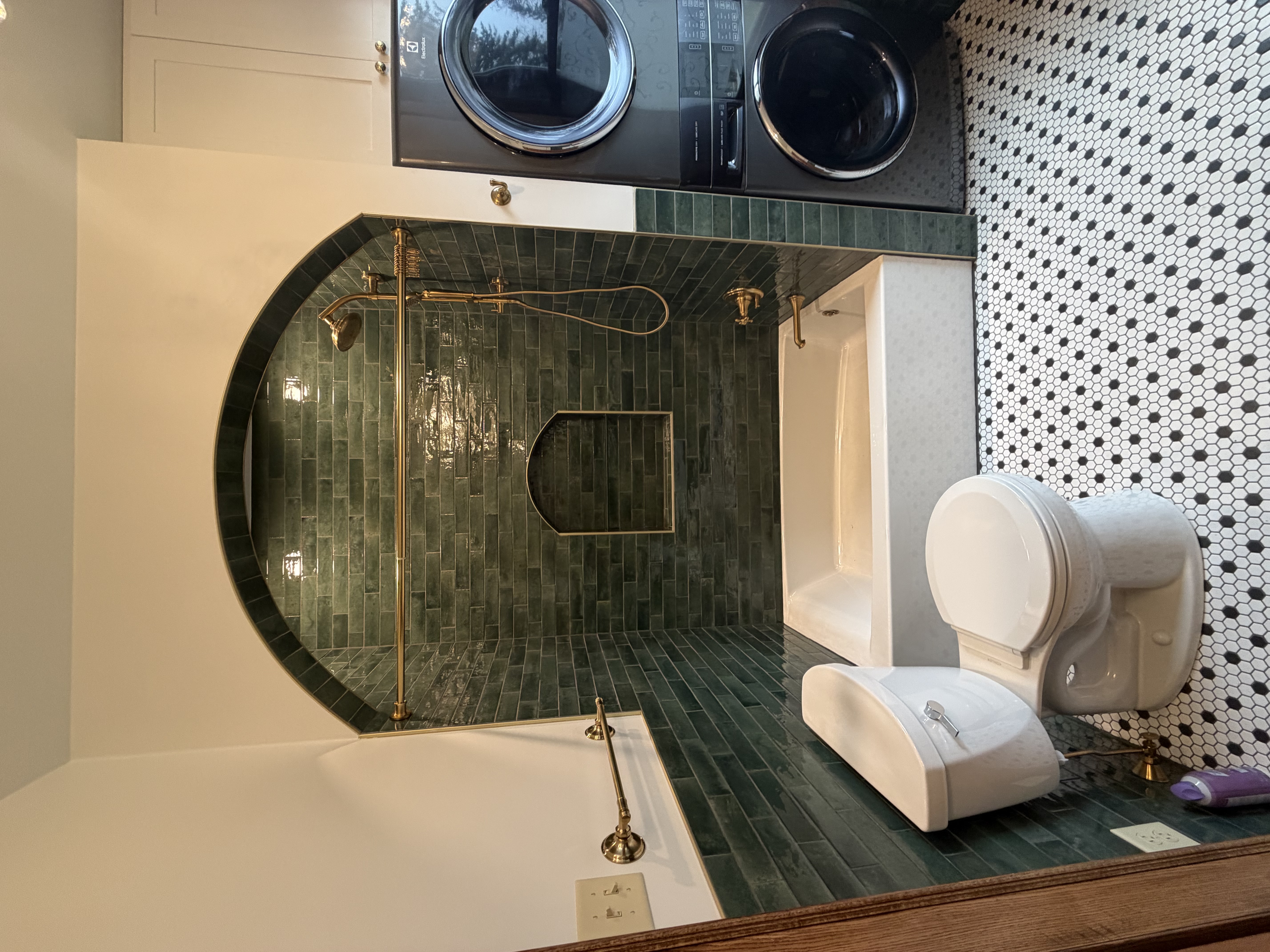 Custom arched tile shower bathroom remodel by DTR Construction